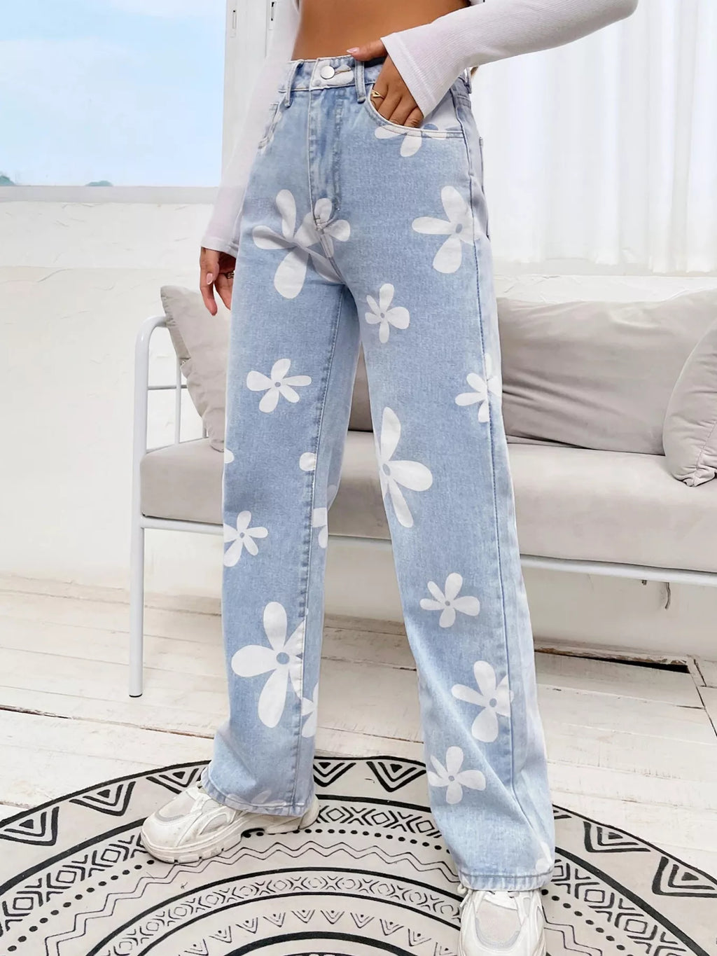 Black floral wide leg jeans back view showing pockets
