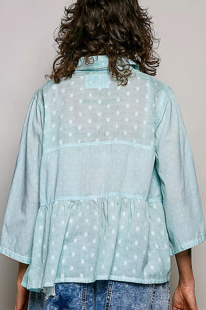 Textured button front shirt collar and button detail