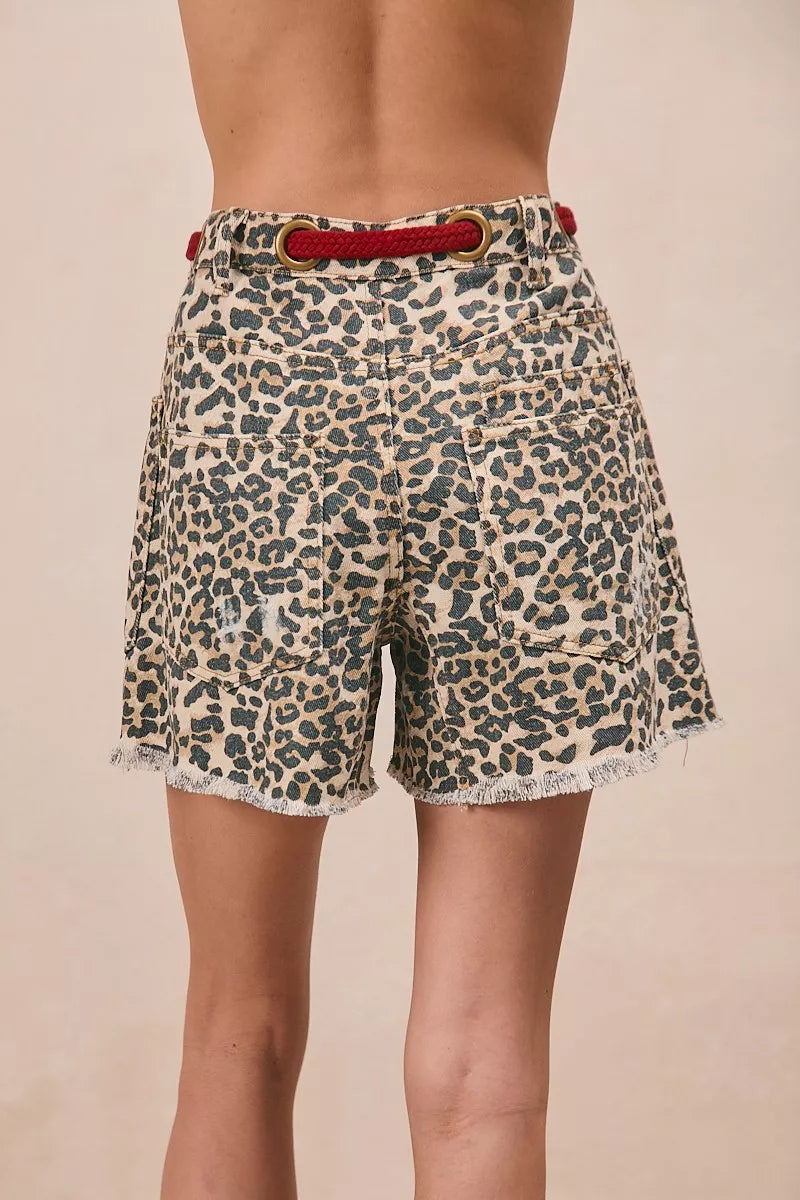 Leopard print shorts side view on model