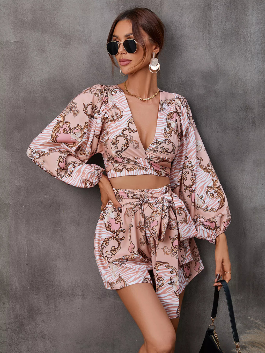 Long sleeve romper in dusty pink full length