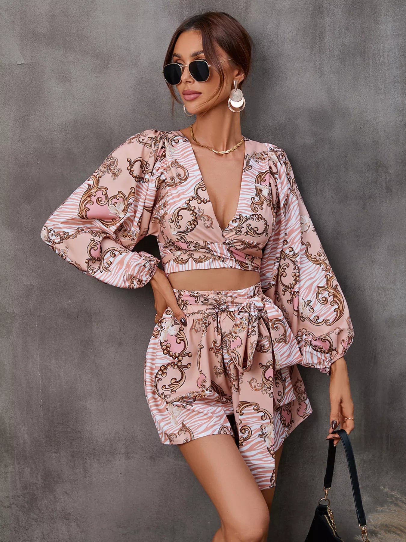 Long sleeve romper in dusty pink full length