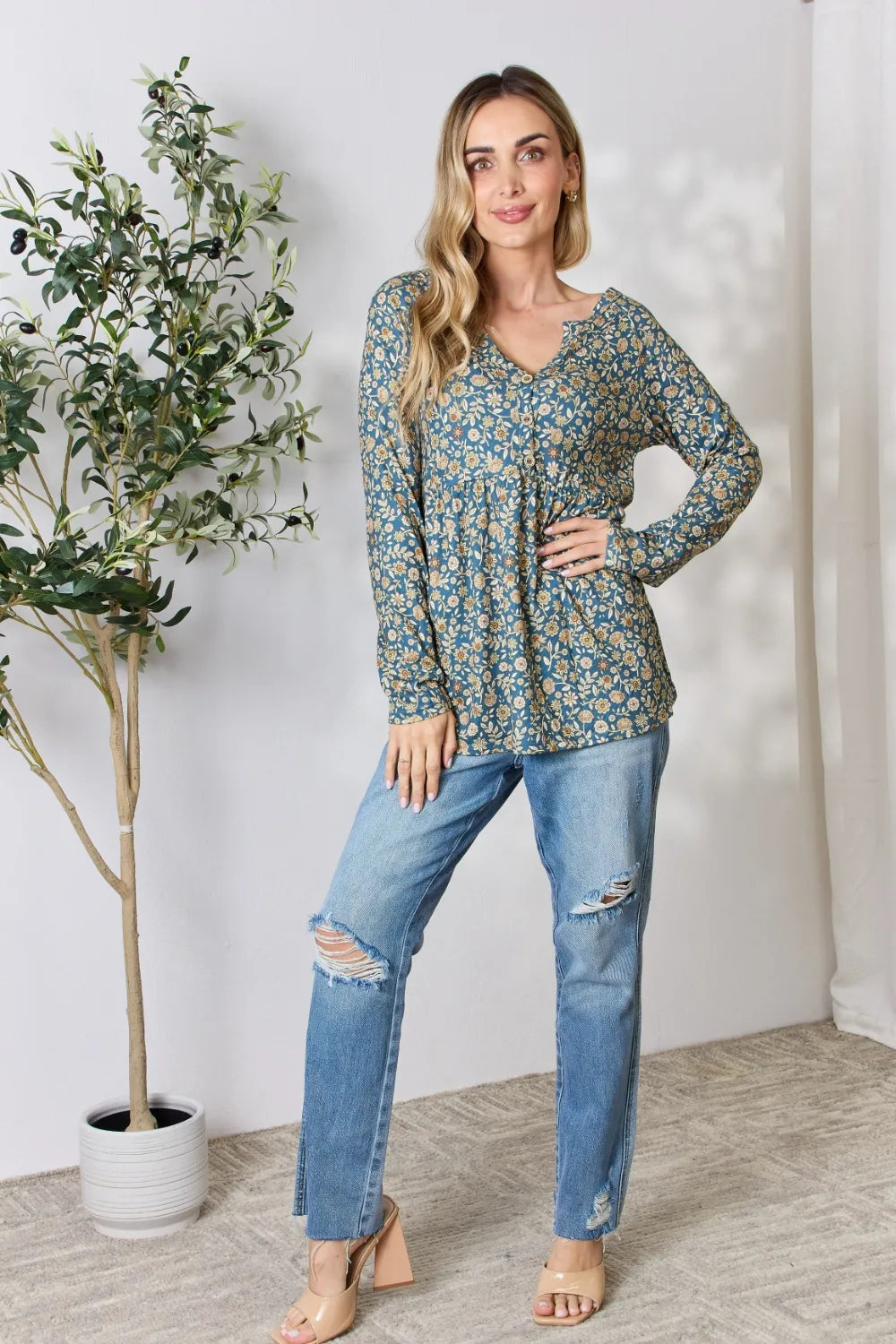 Floral half button blouse back view
