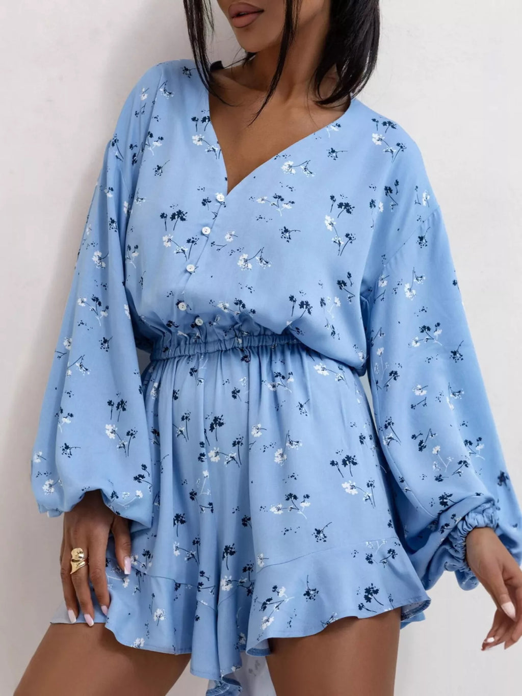 Floral romper buttoned front detail