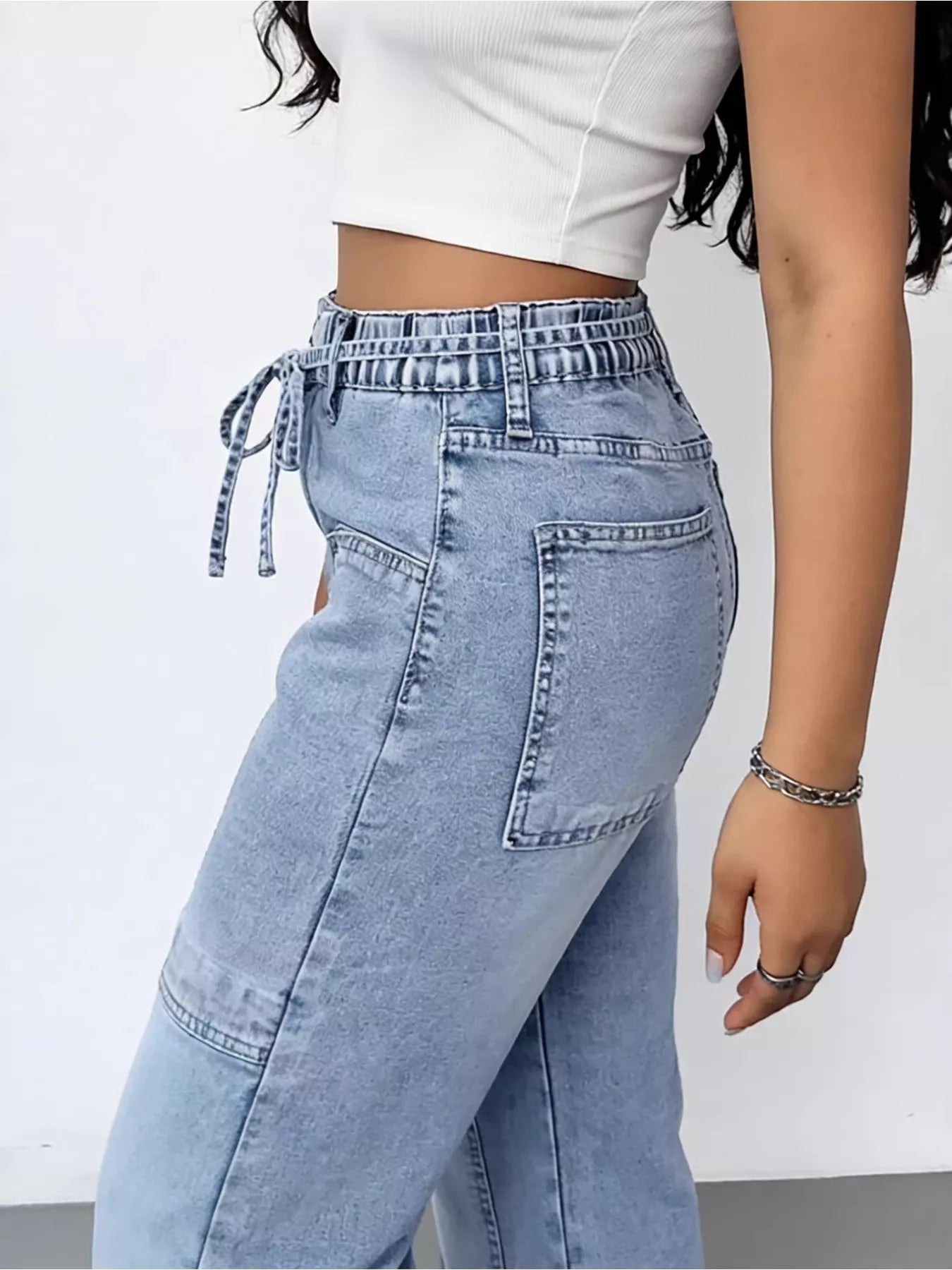 Woman wearing washed wide leg cargo jeans