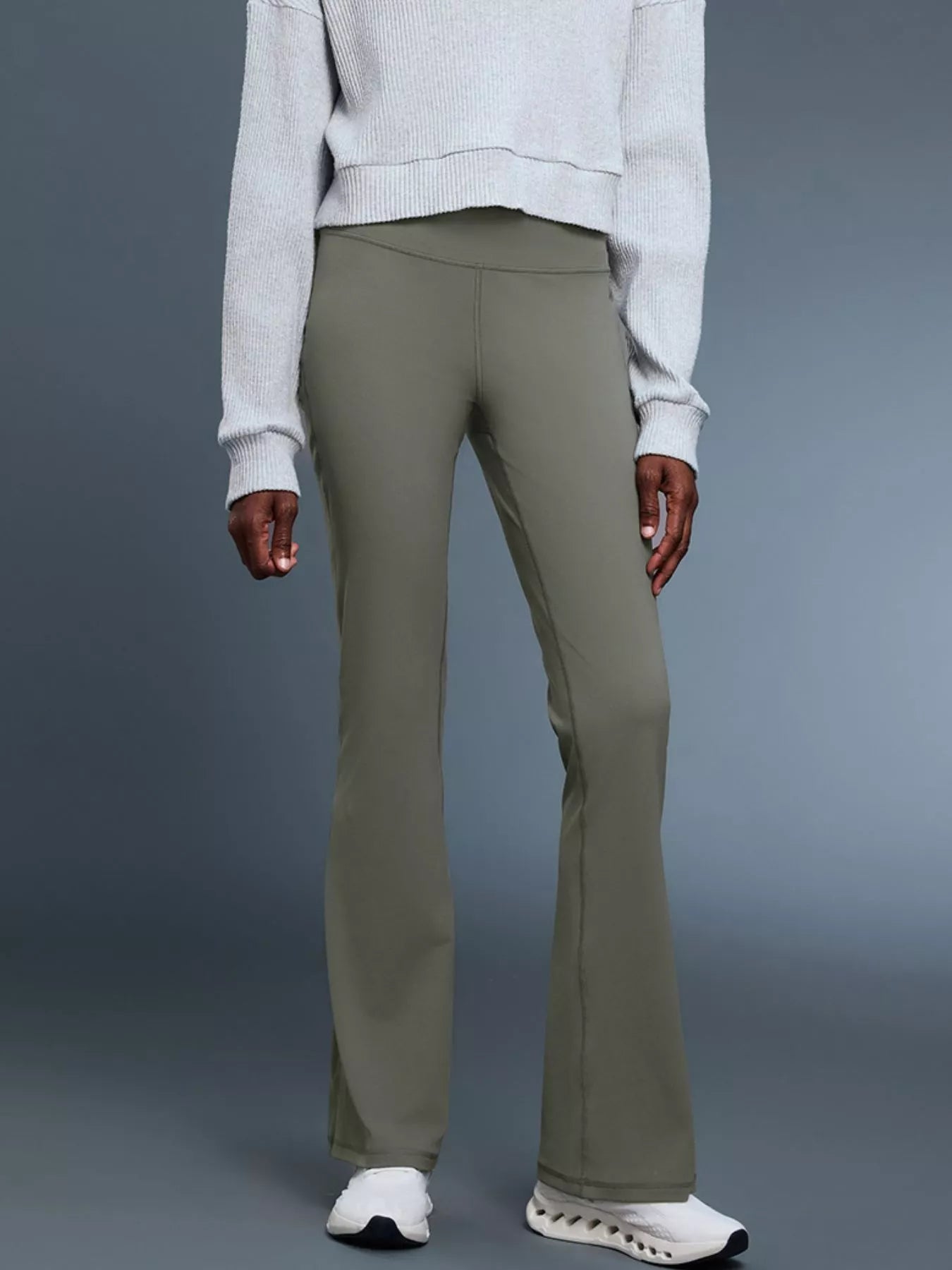Flare active pants in sage front view