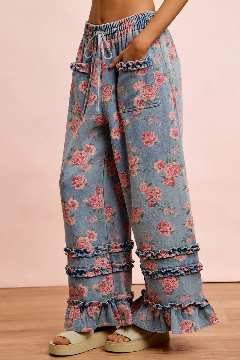 Woman wearing floral washed denim wide leg pants