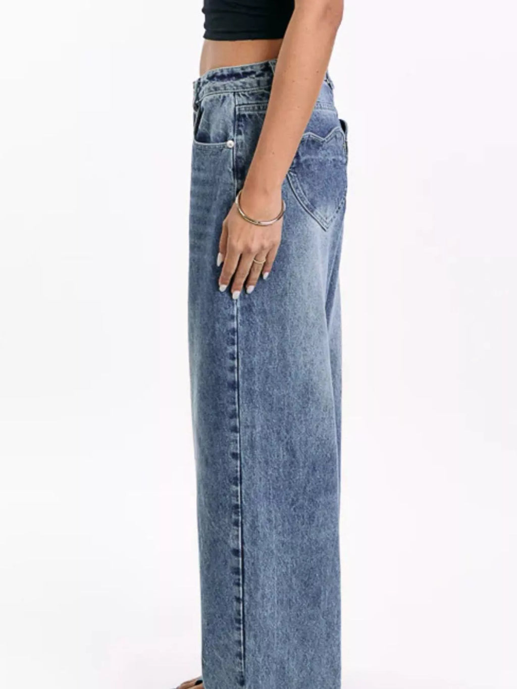 Blue wide leg jeans styled full length view