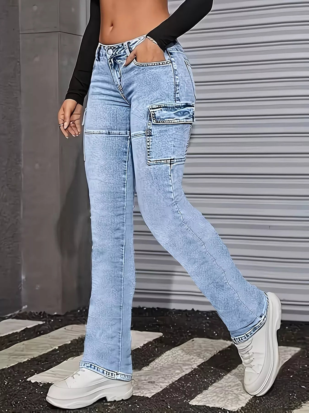 Seam detail on washed blue jeans