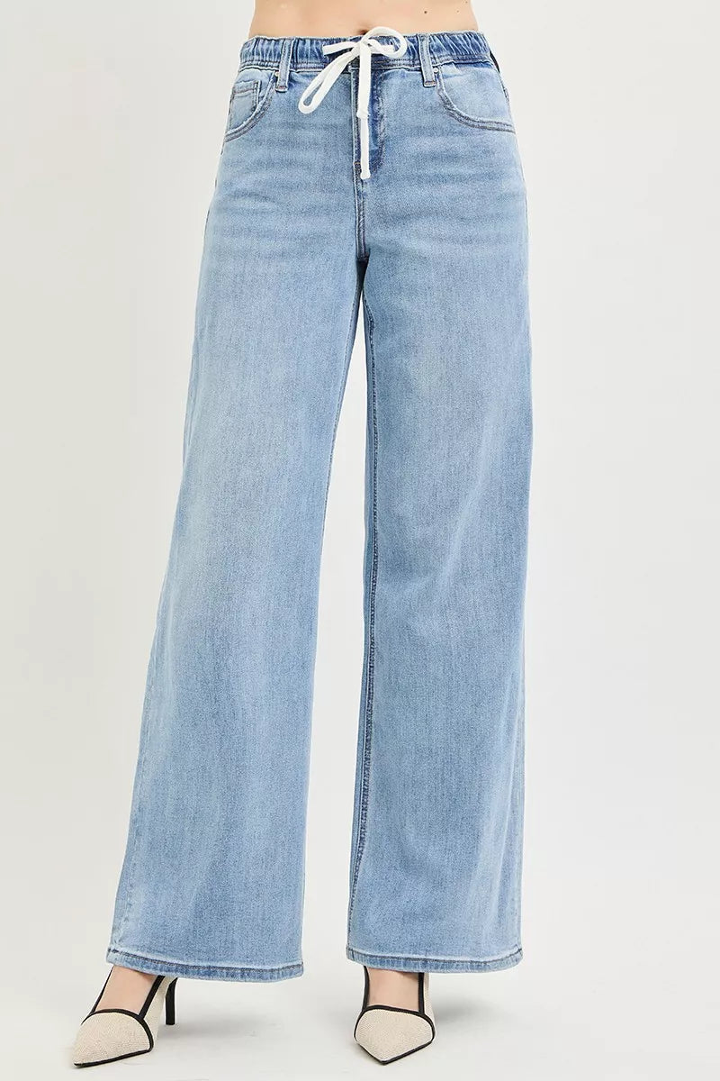 RISEN slouchy wide leg drawstring jeans light wash front view on model