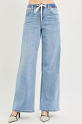RISEN slouchy wide leg drawstring jeans light wash front view on model