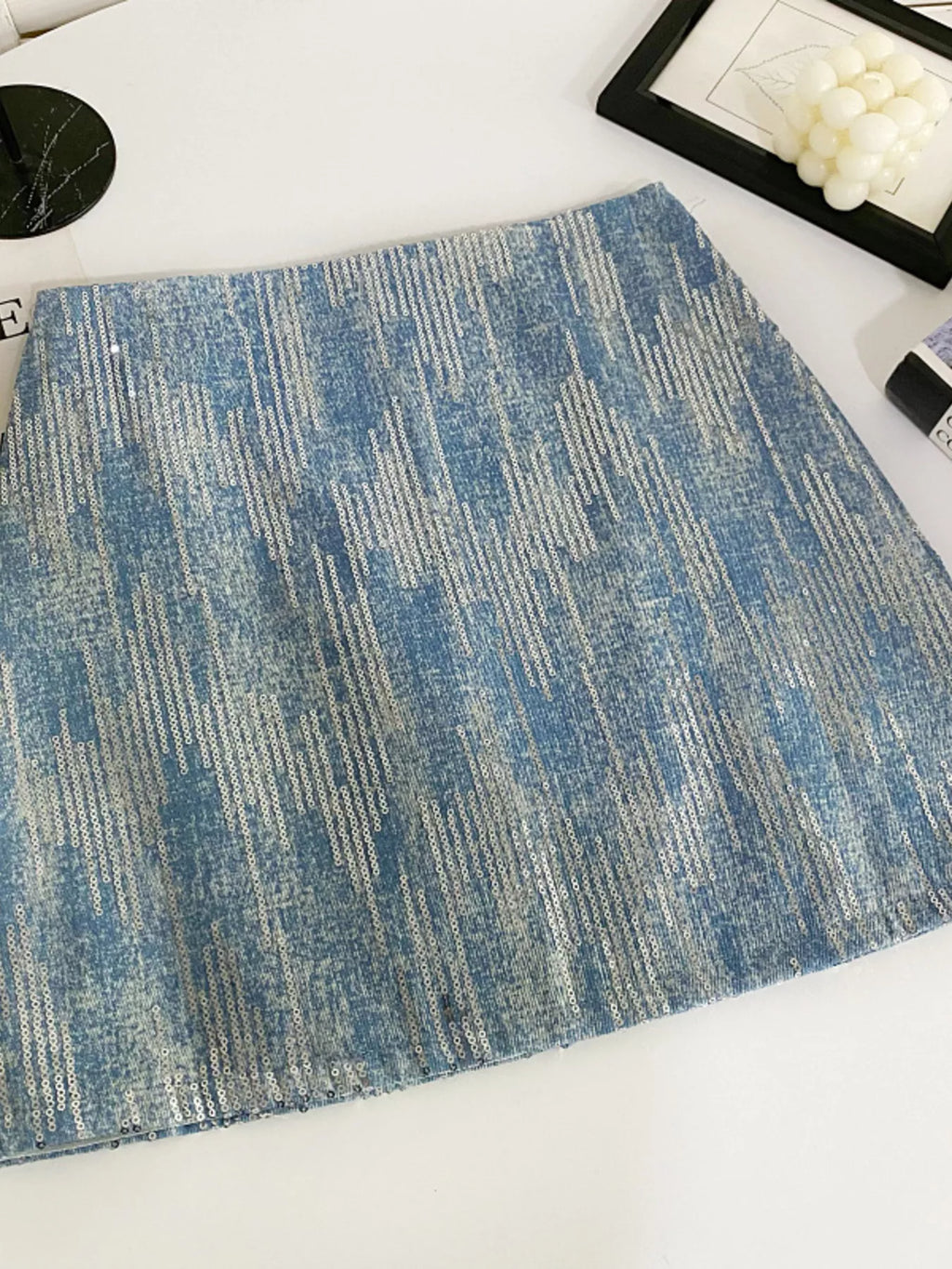 Sequin mini skirt in light blue side