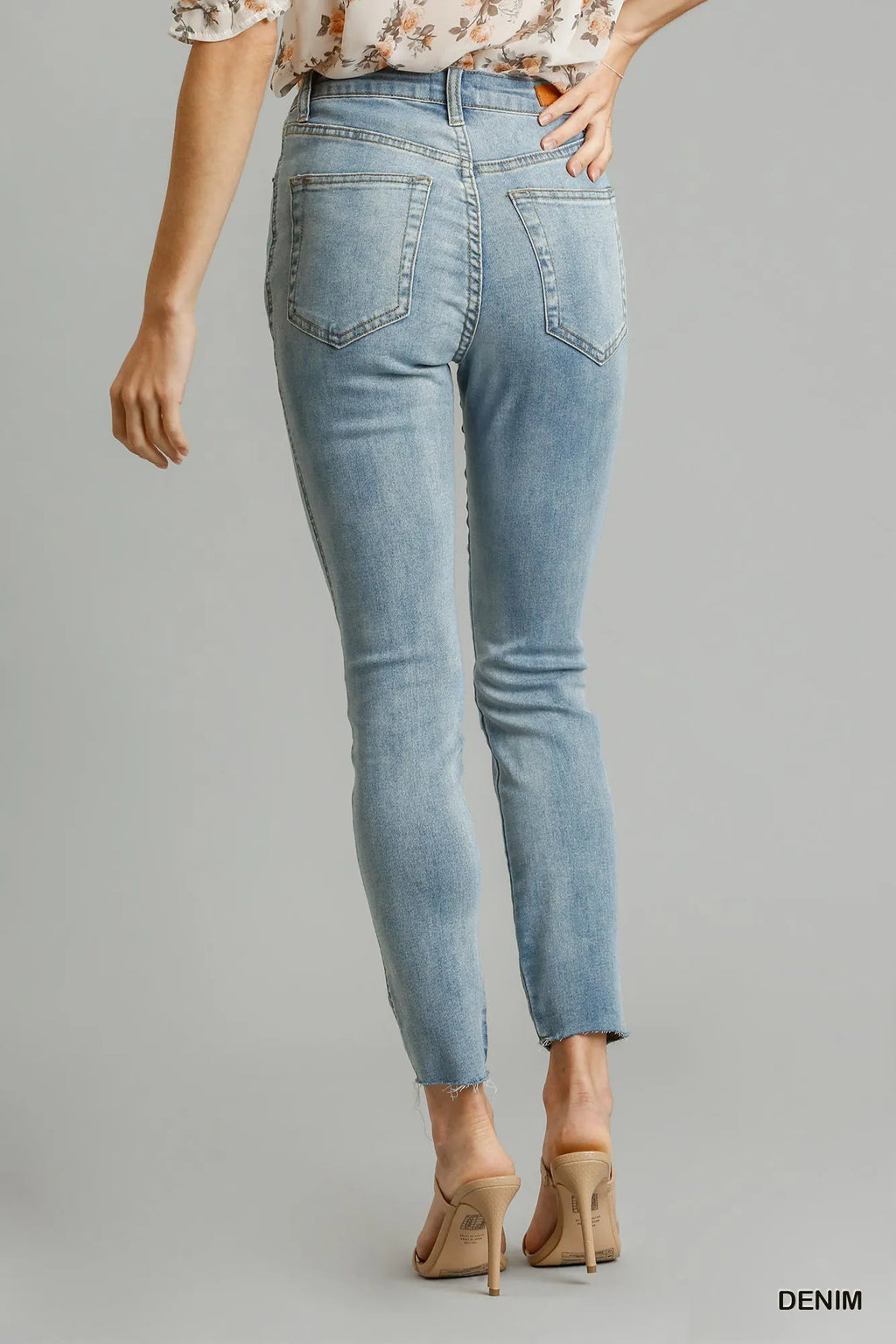 Distressed stretch denim skinny jeans back pocket view