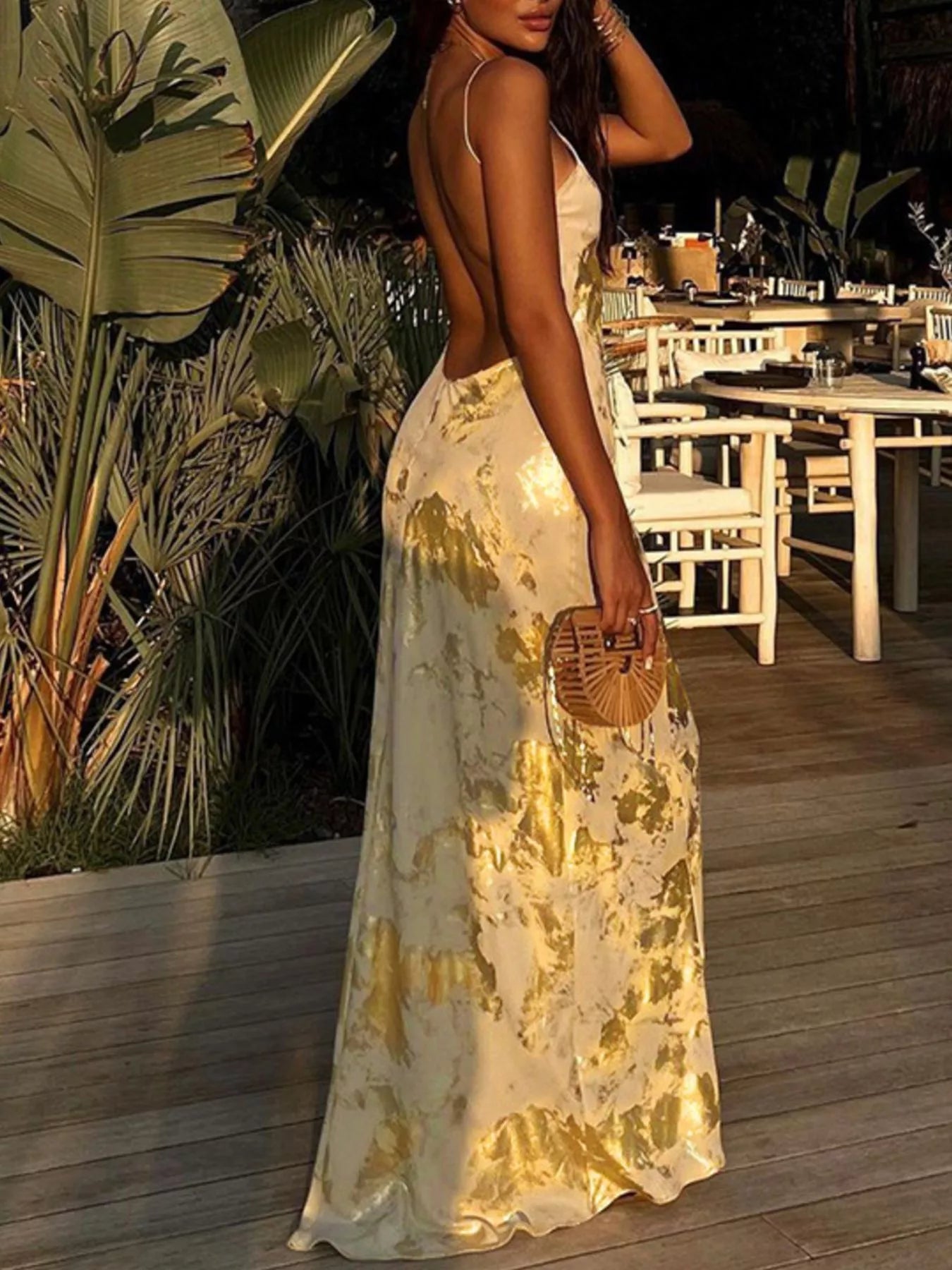 Gold backless maxi dress side view