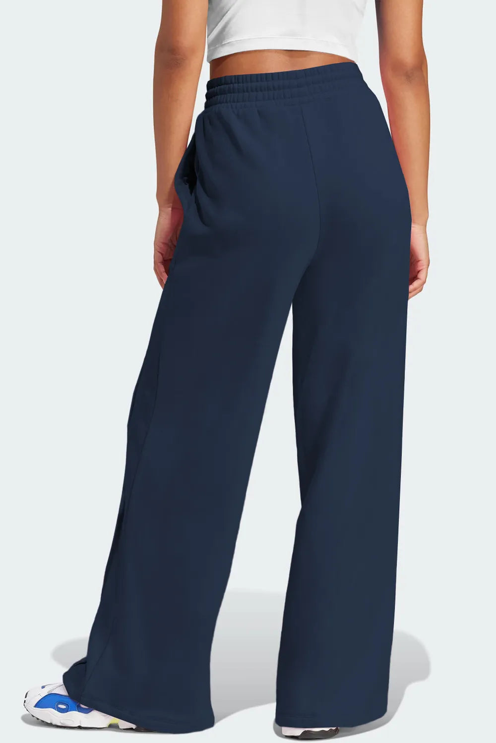 Model styling drawstring wide leg pants