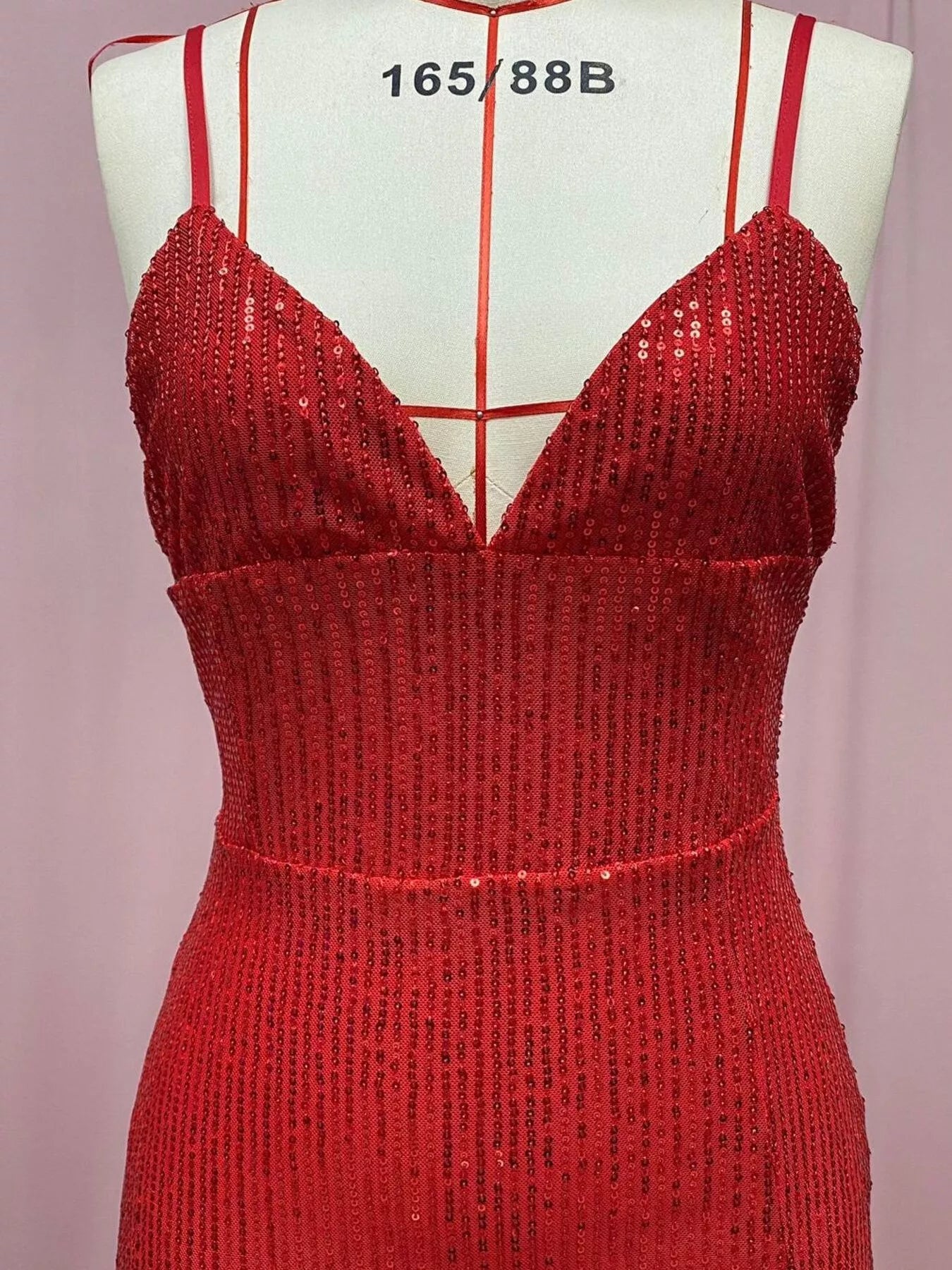 Sequin maxi dress side view showing high slit