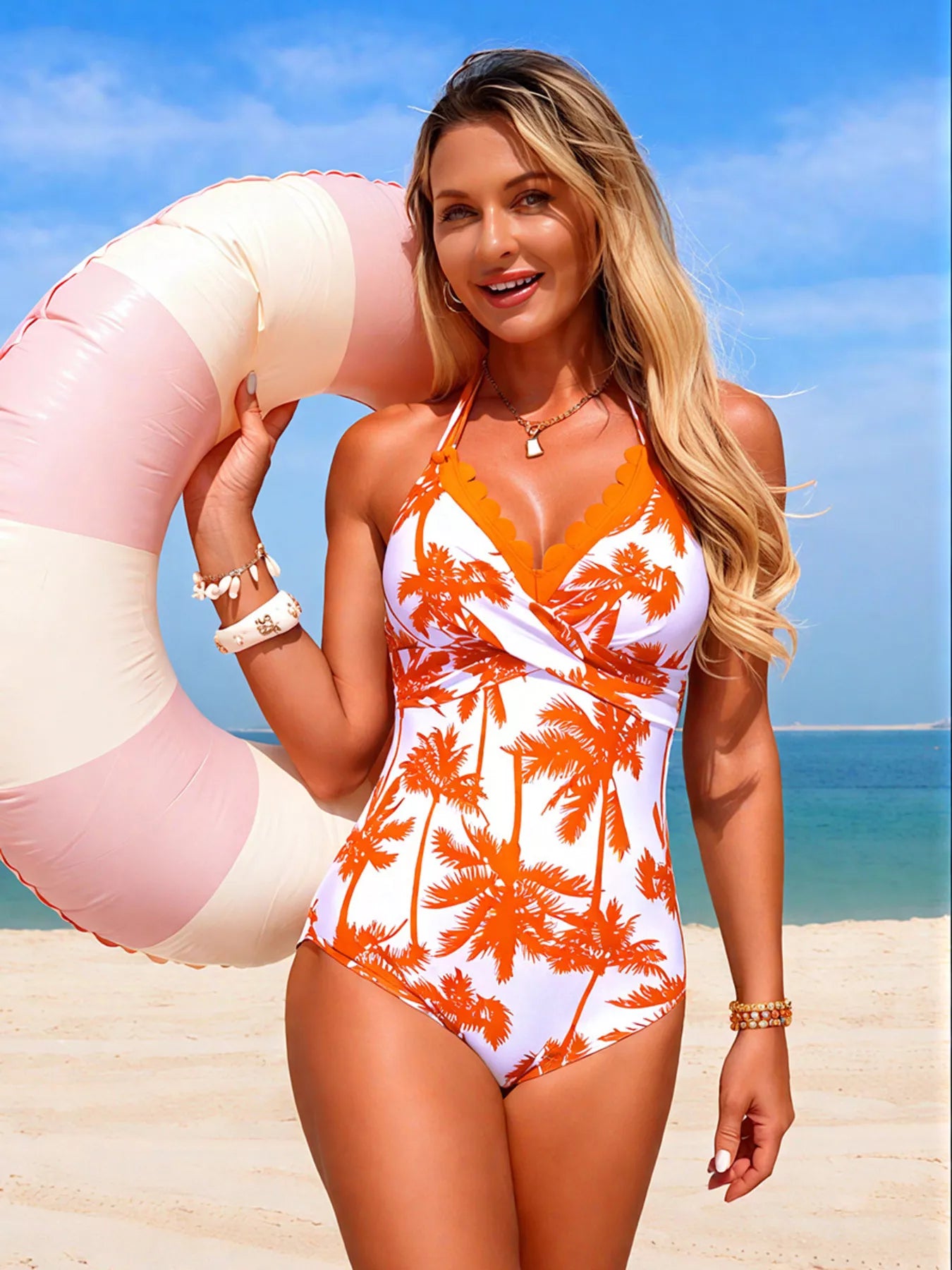 Tropical one piece swimsuit worn at beach