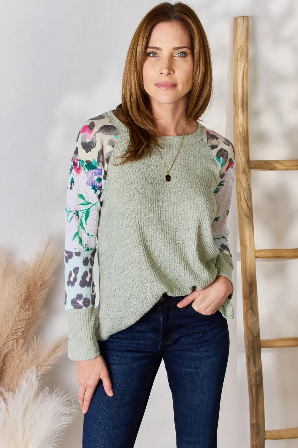 Printed round neck blouse front view in sage