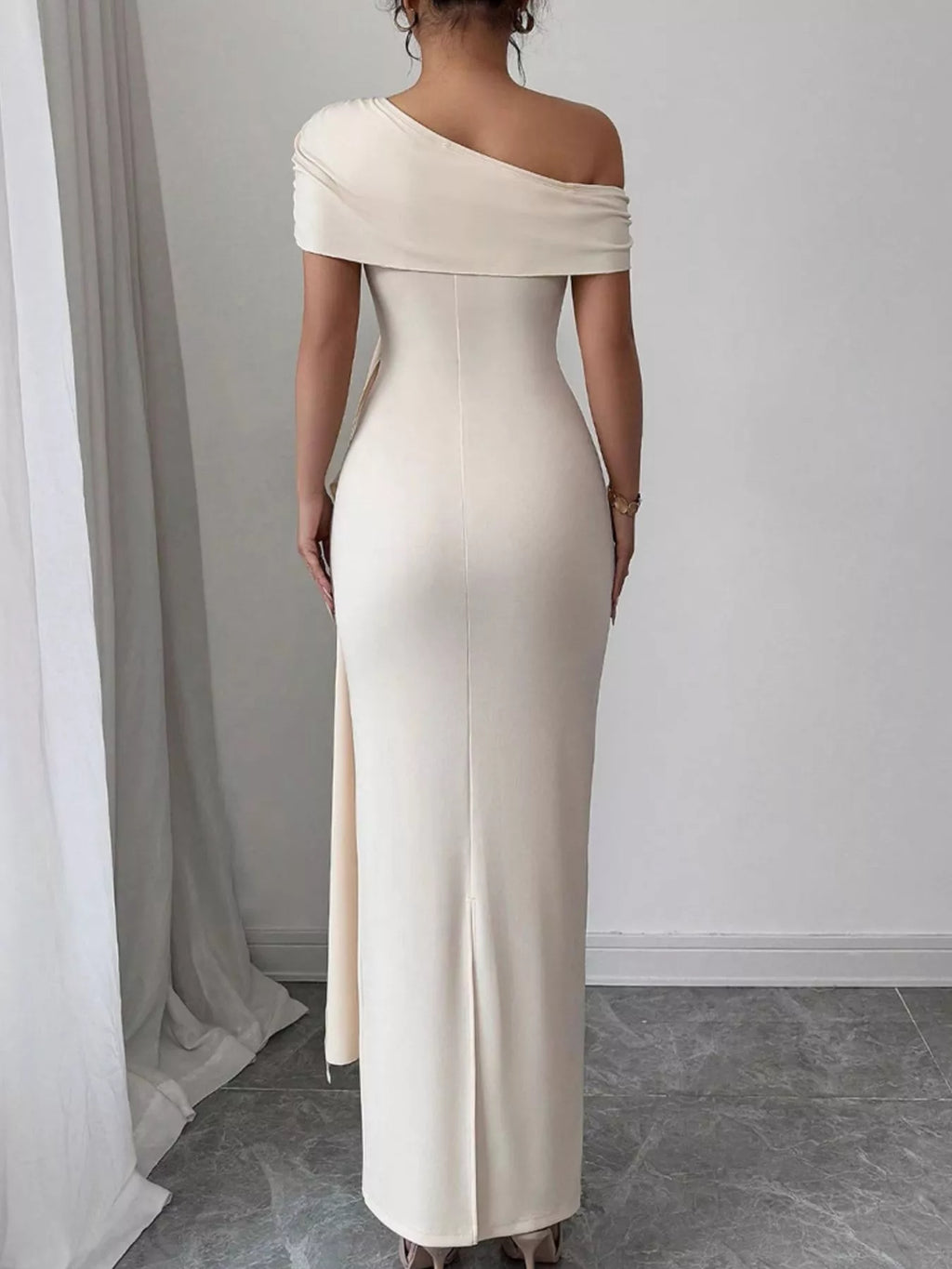 Ruched maxi dress side view showing one shoulder neckline