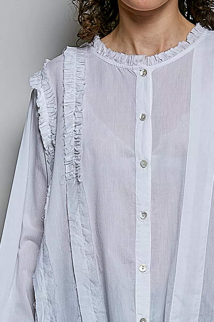 Ivory ruffle trim shirt styled full look