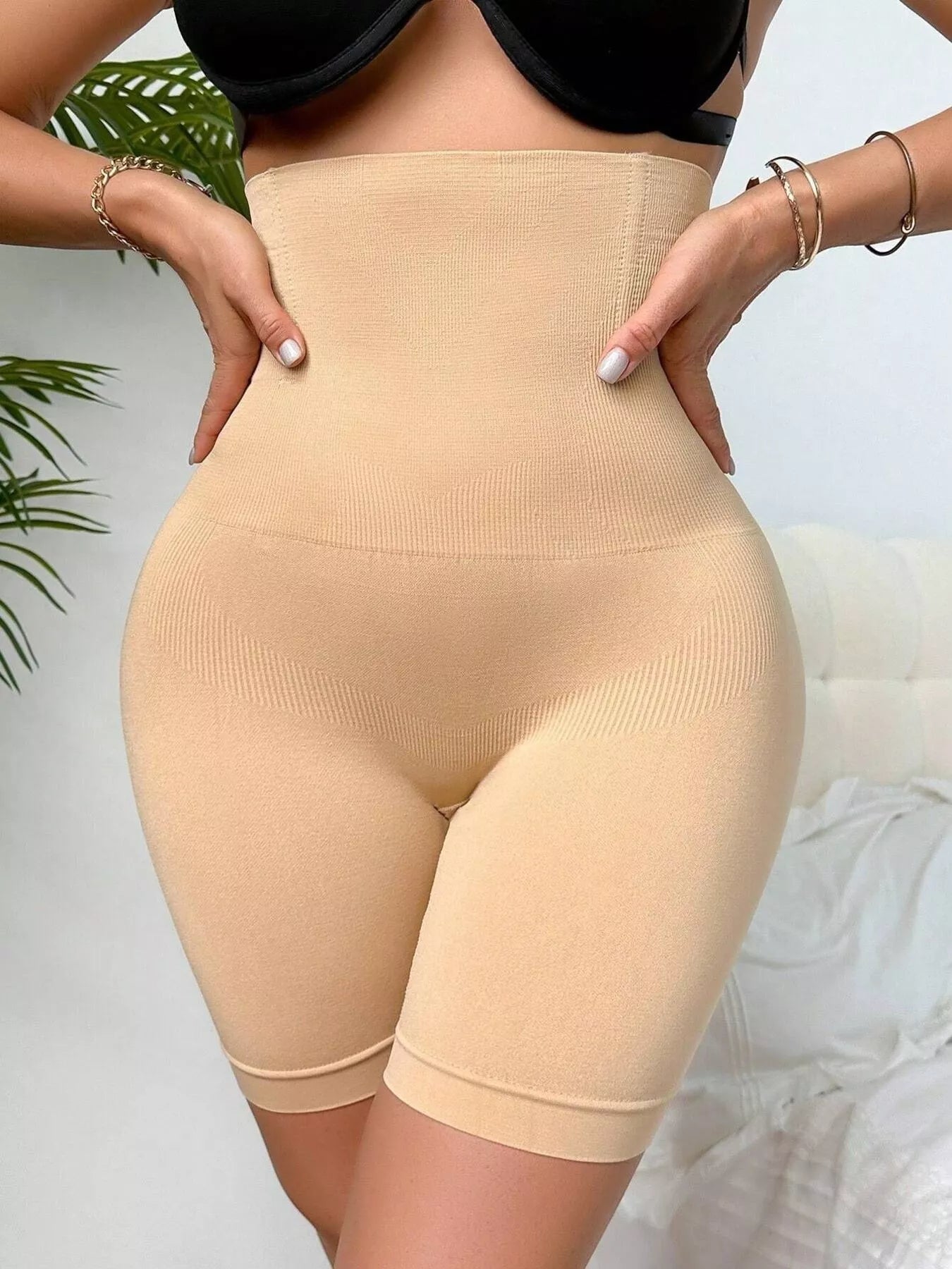 Tan slimming leggings back view