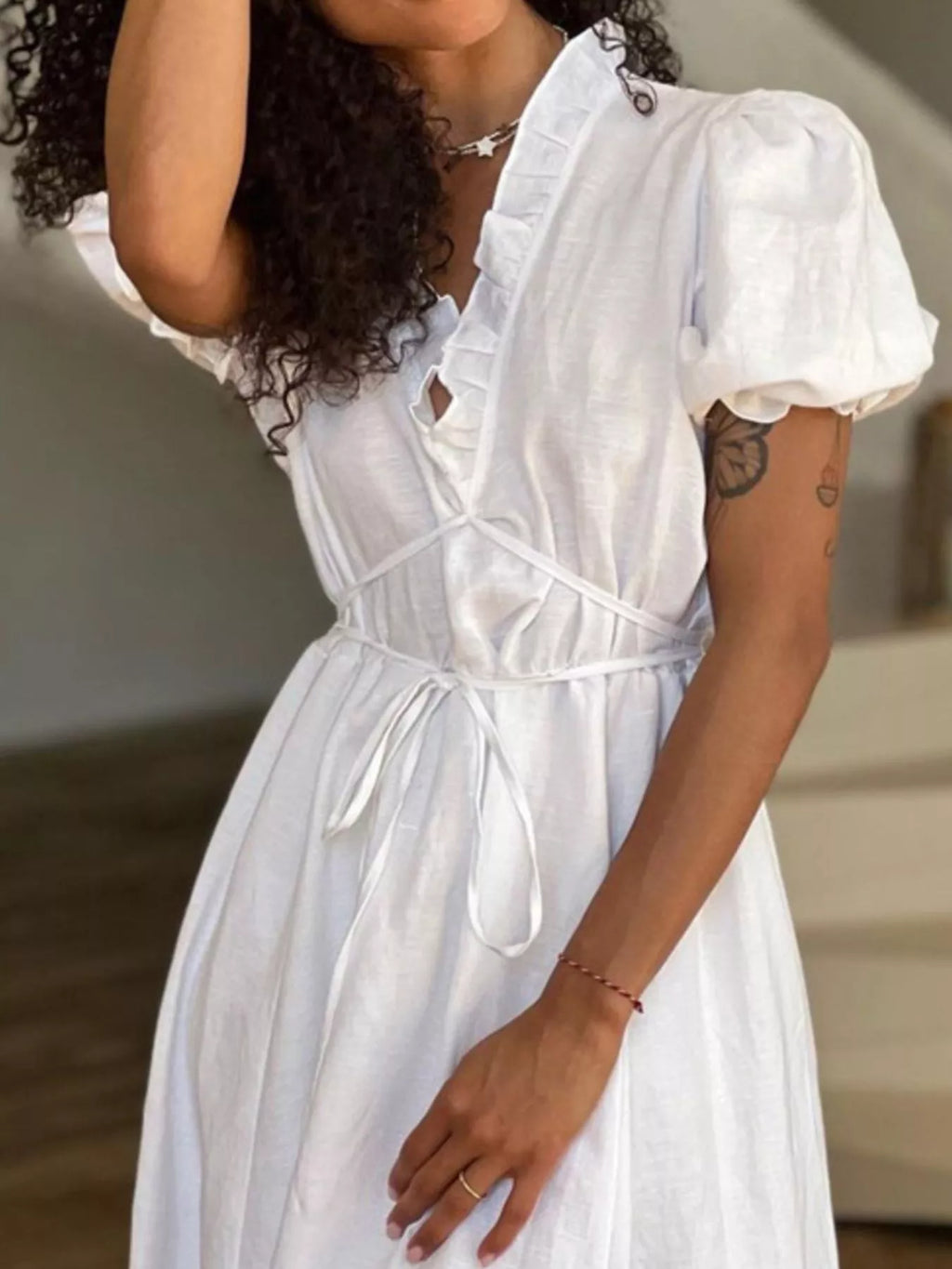 Puff sleeve maxi dress back view on model