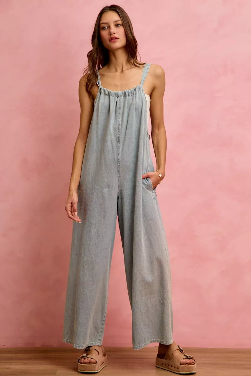 Wide leg denim overalls styled with a basic tee