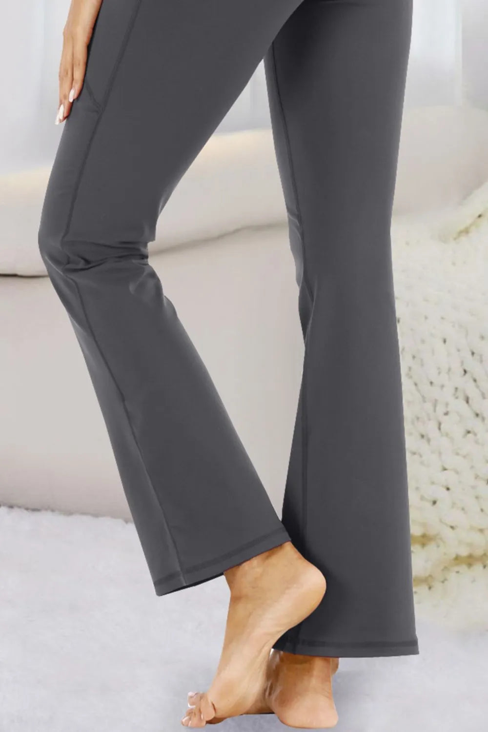 Violet pocketed active pants on model