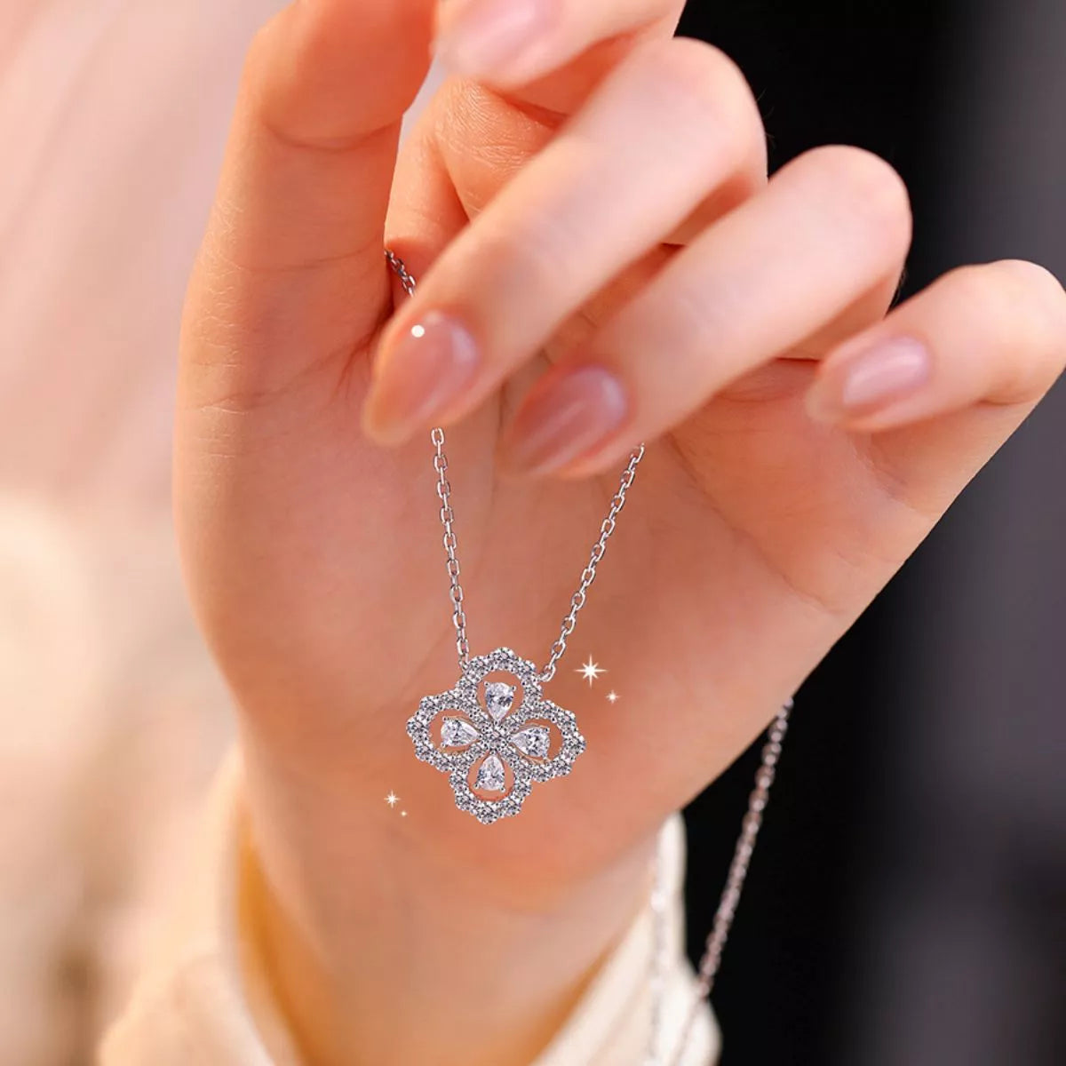 Silver clover pendant necklace close up