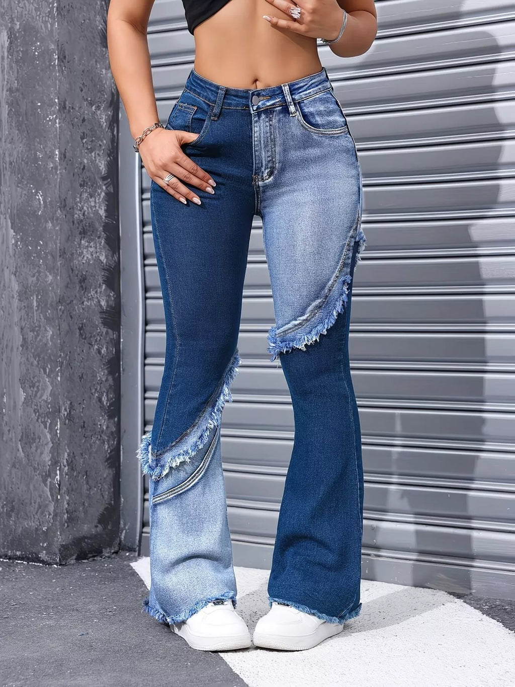 Model wearing two tone flare jeans styled outfit