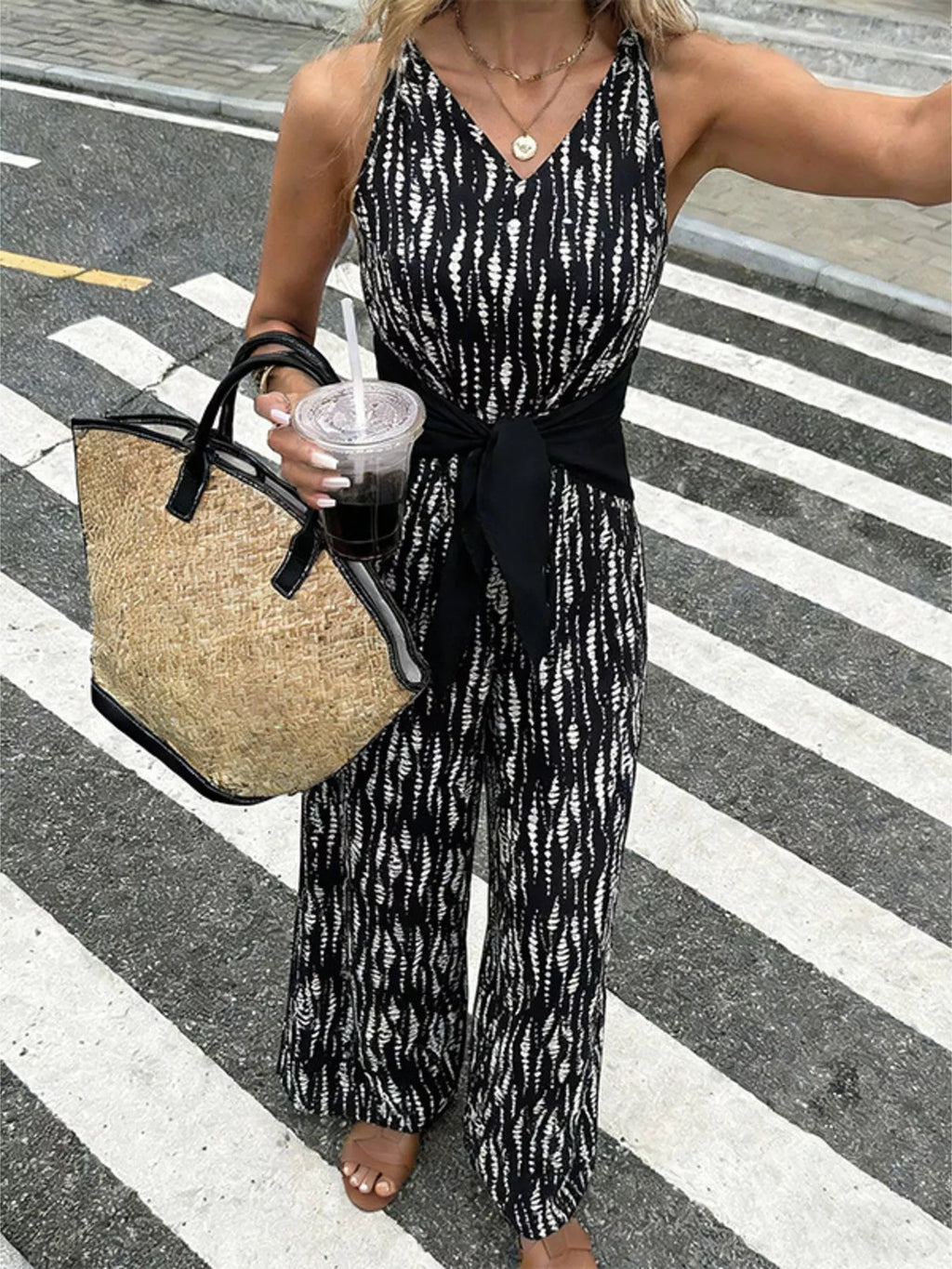 Printed jumpsuit in blue front view
