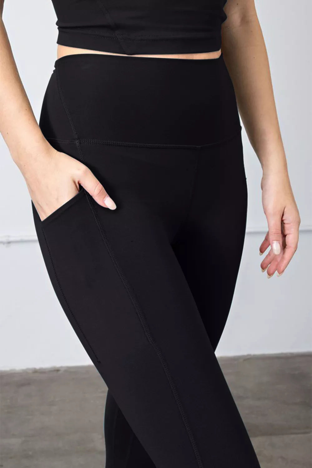 High waist leggings styled for the gym on model