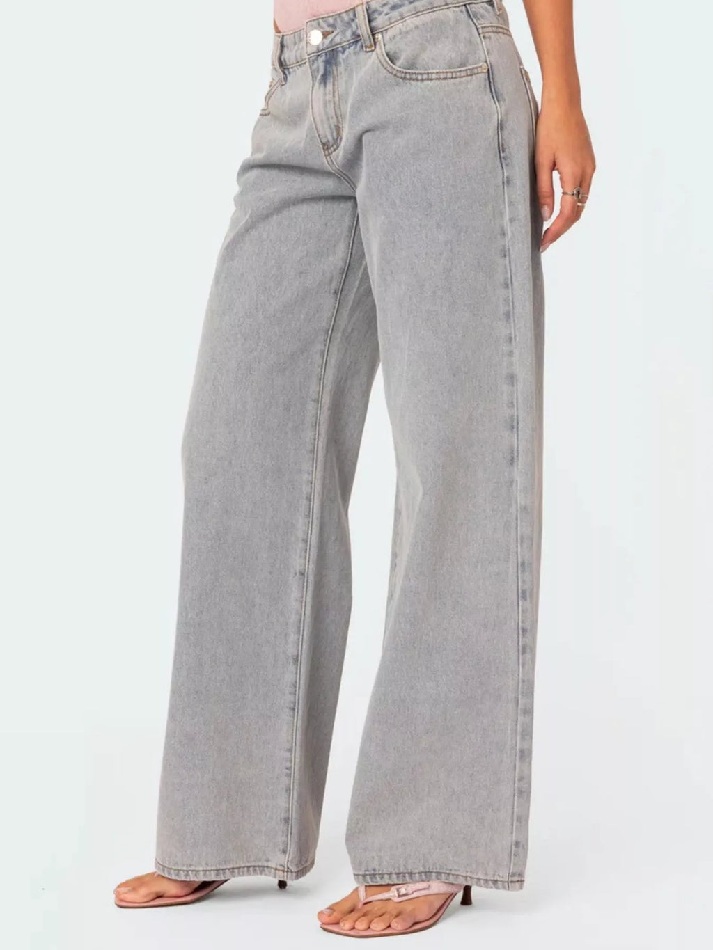 Light wash wide leg jeans back view showing pockets