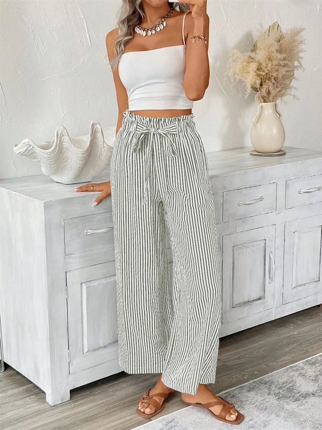 Dusty pink wide leg paper bag pants tie waist detail