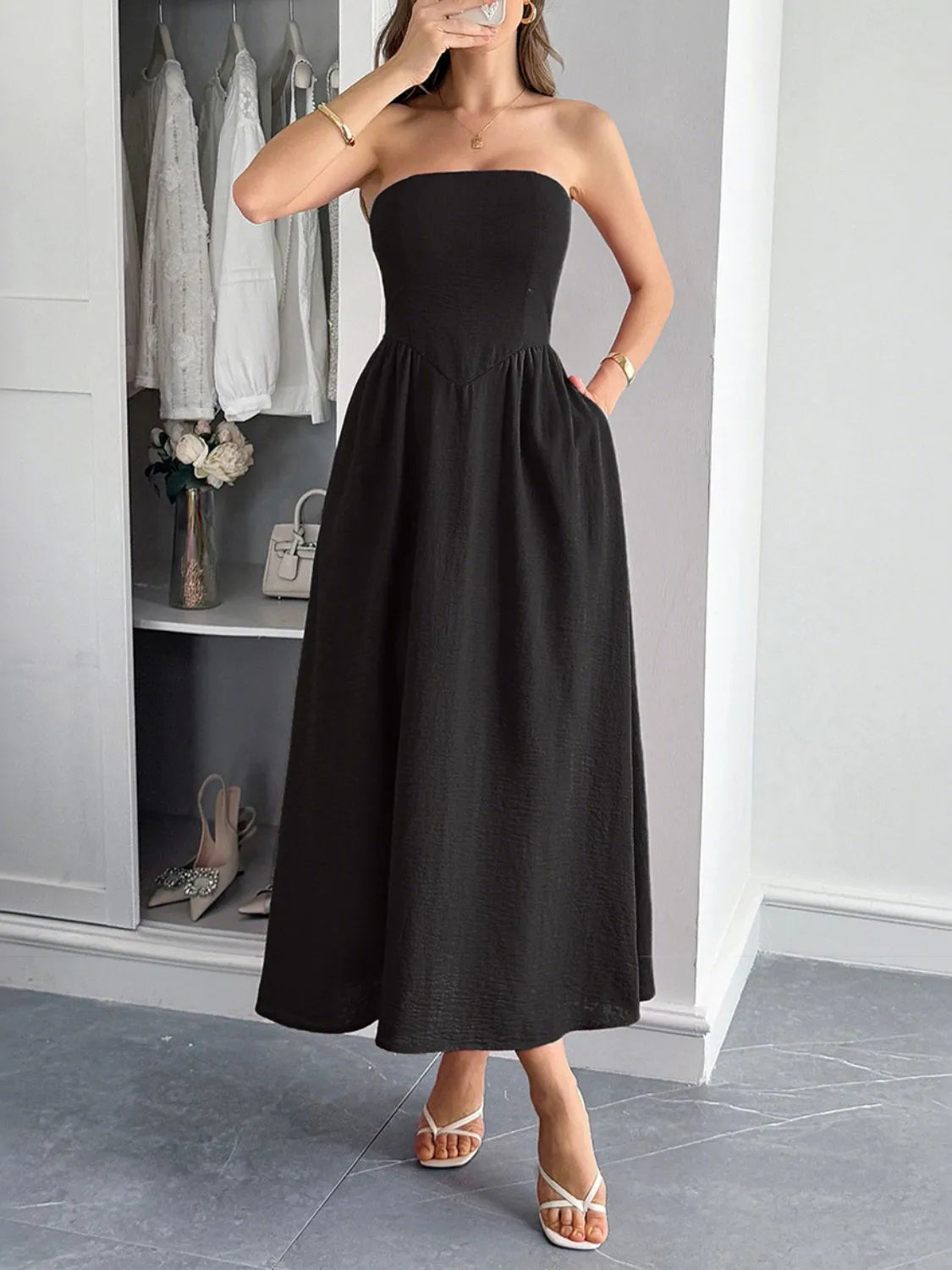 Strapless a line midi dress with pockets in black front view