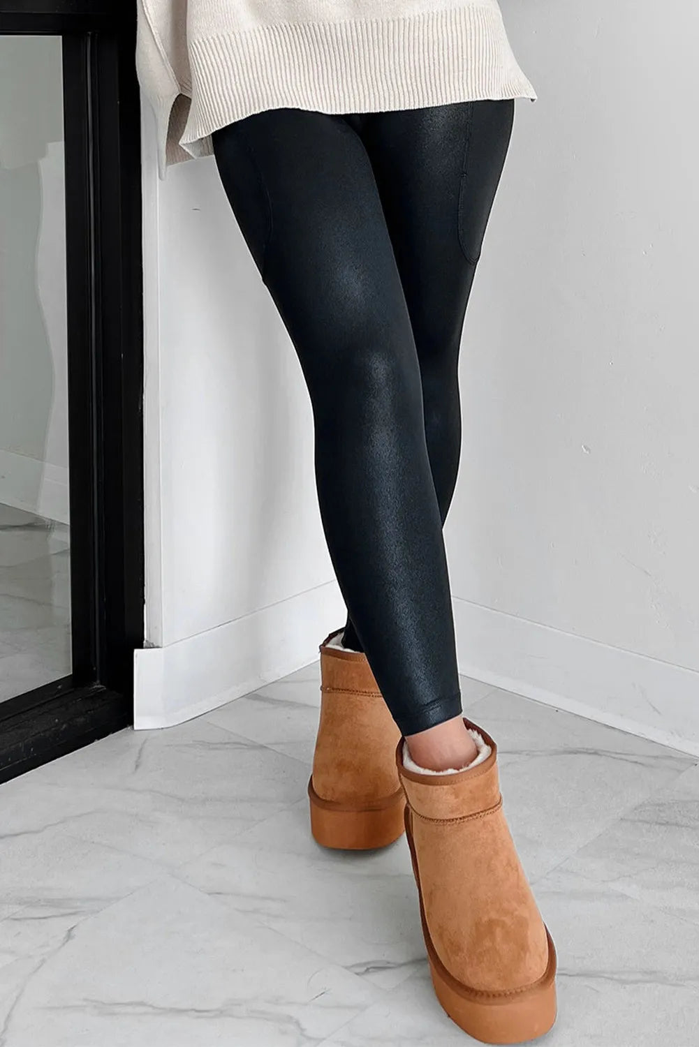 V cut waistband leggings close up of high waist detail
