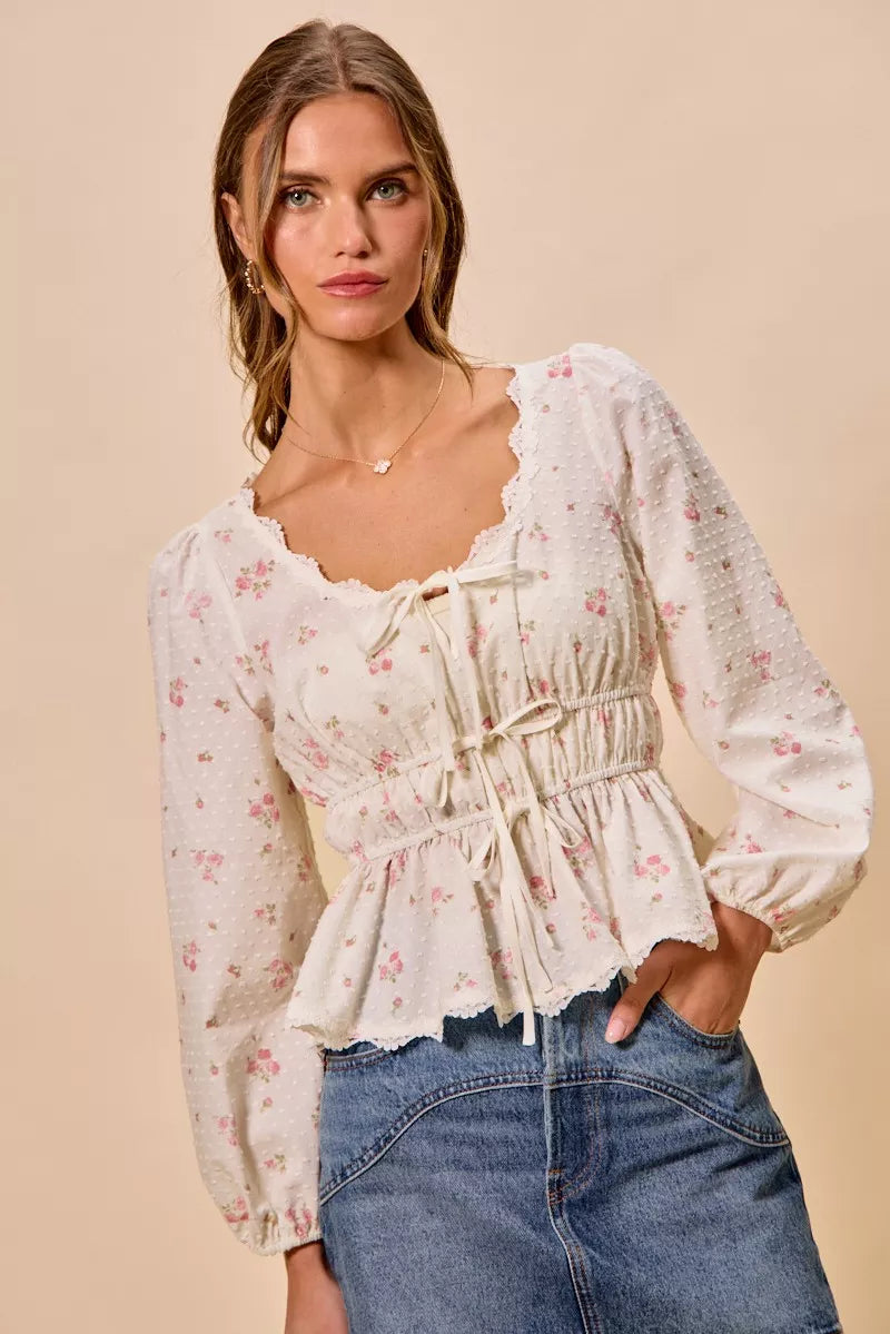White floral blouse three quarter view on model