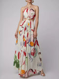 White printed halter cutout maxi dress front view