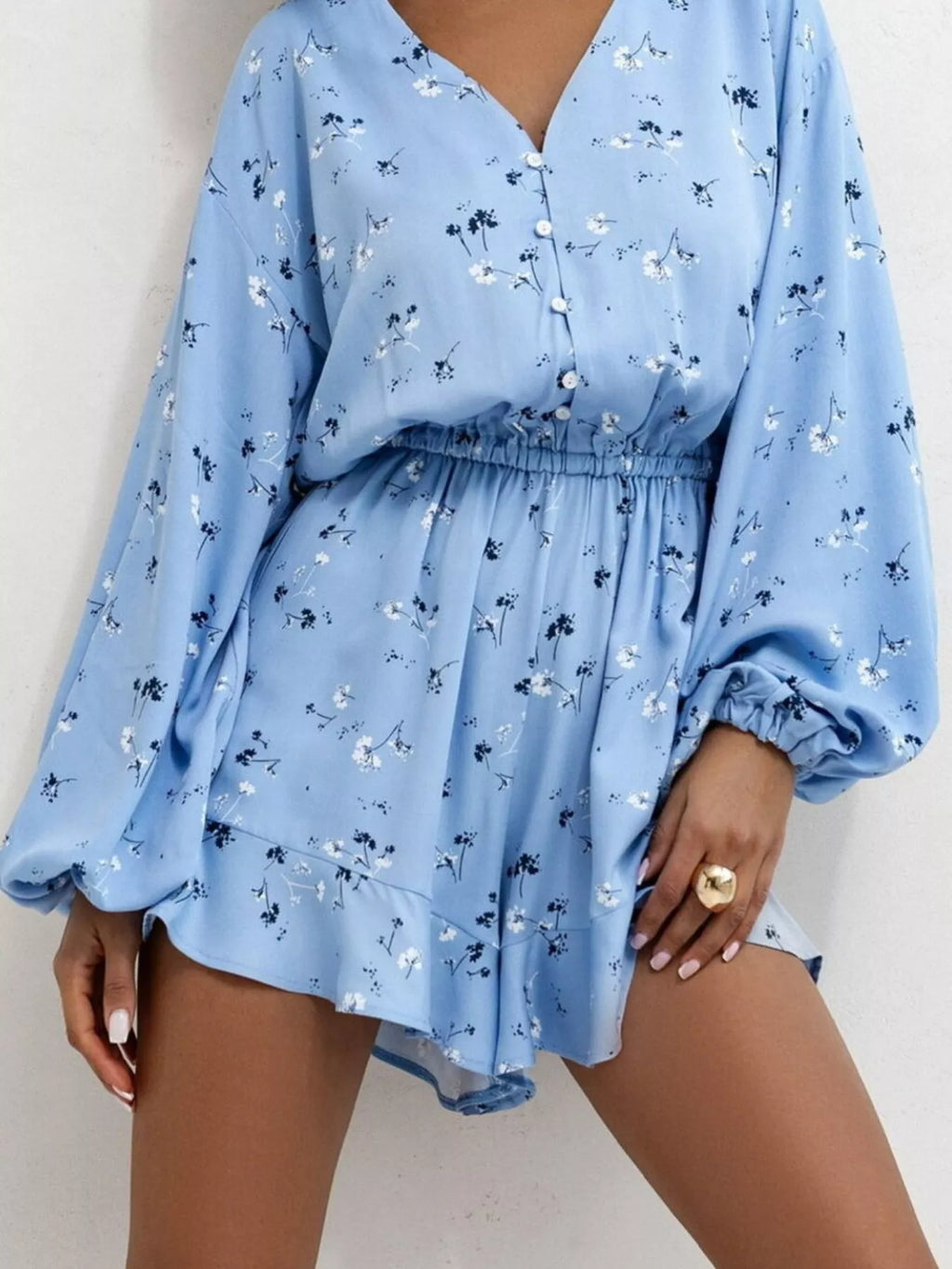 Womens floral V neck romper on model