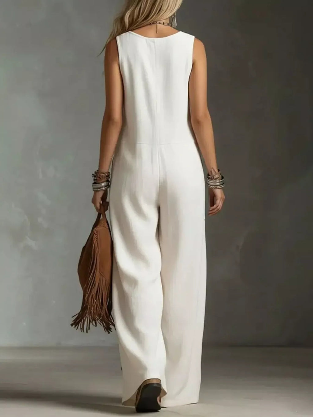 White wide leg jumpsuit on model side view