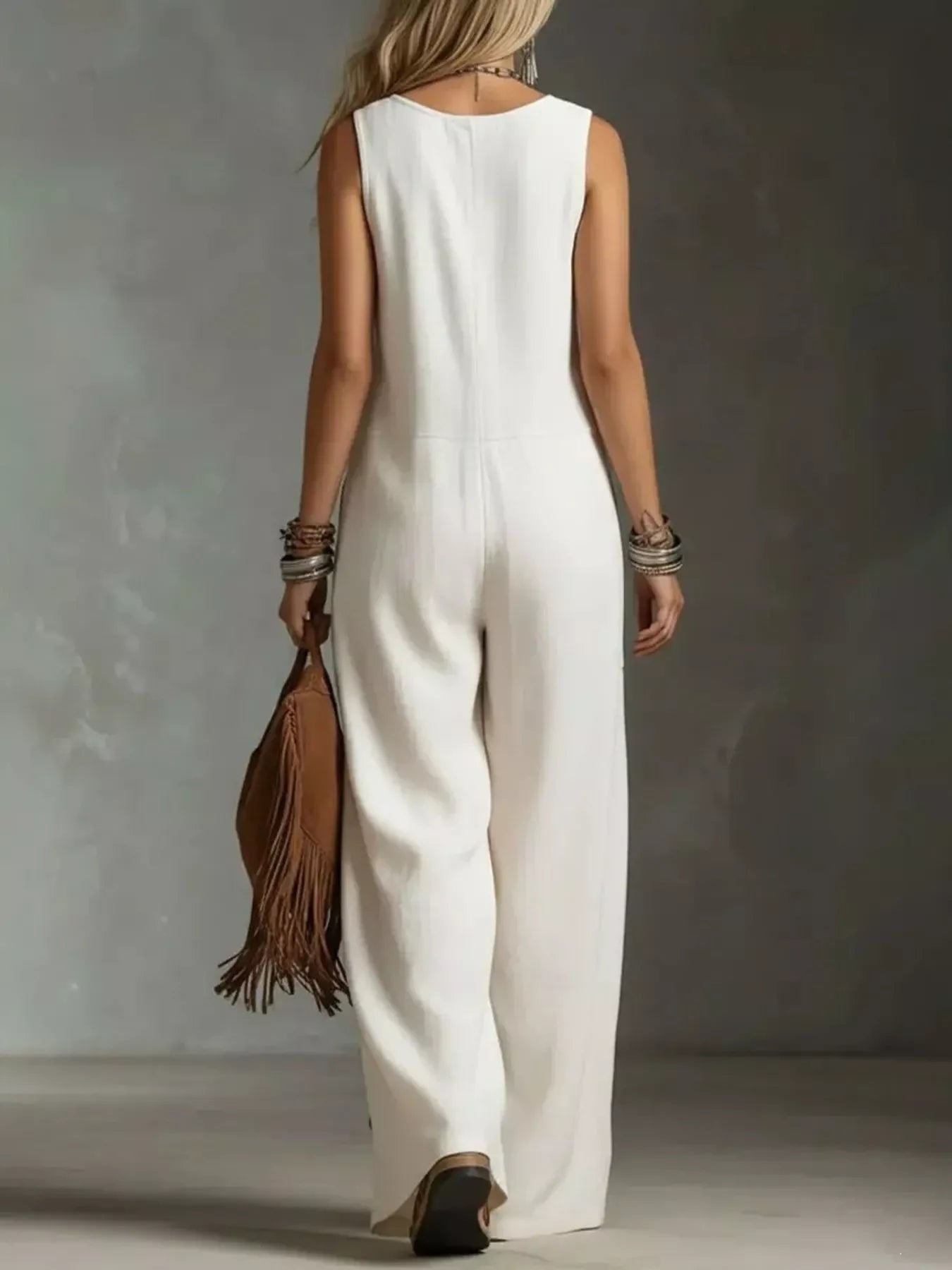 White wide leg jumpsuit on model side view