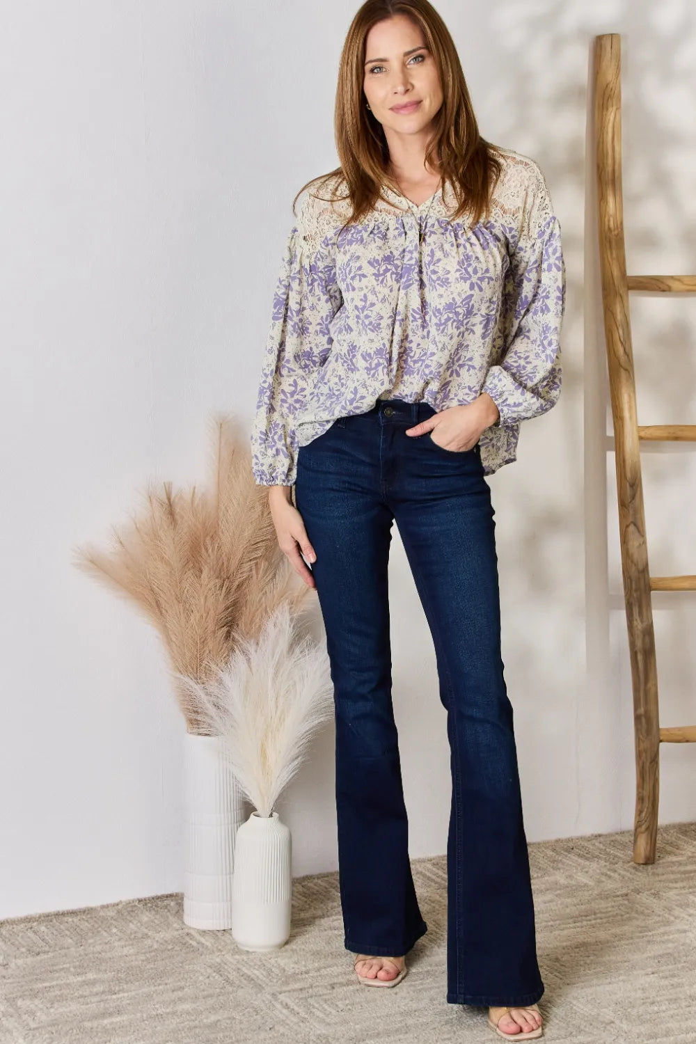 Lace detail blouse worn on model
