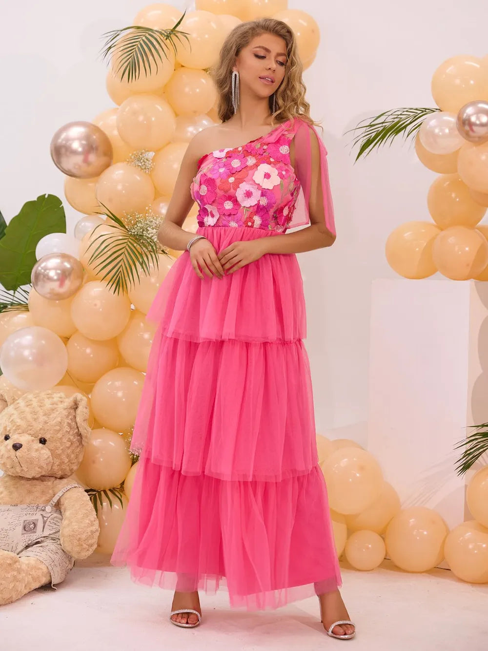 One shoulder embroidered midi dress styled for an event