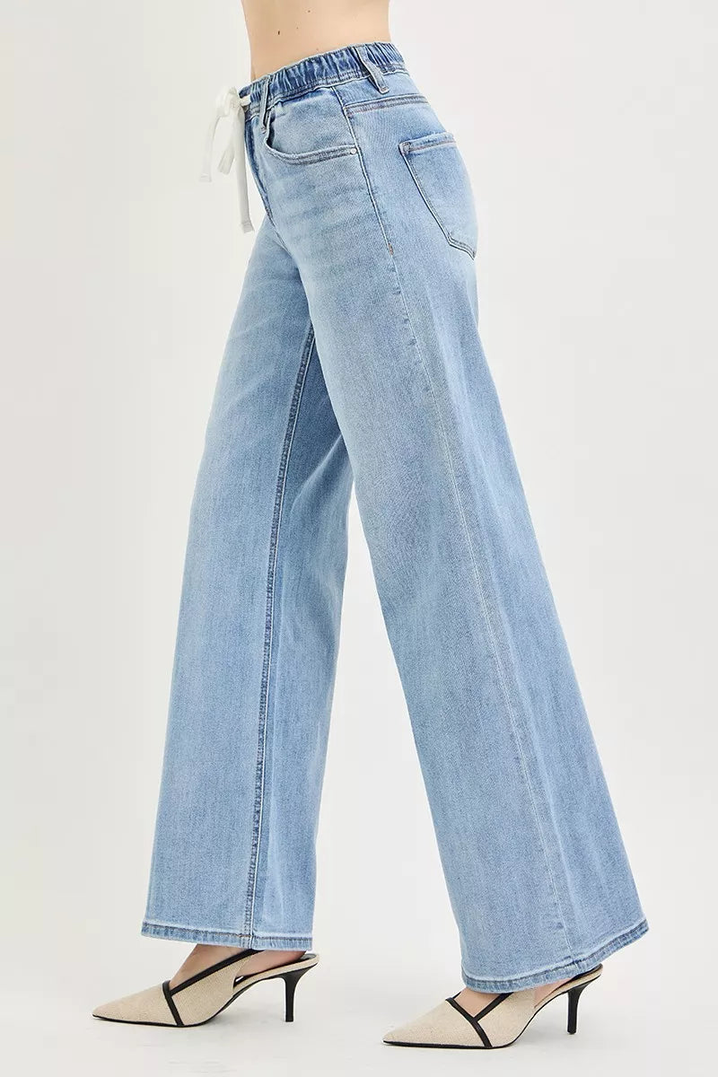 Elastic waistband and drawstring detail on RISEN jeans