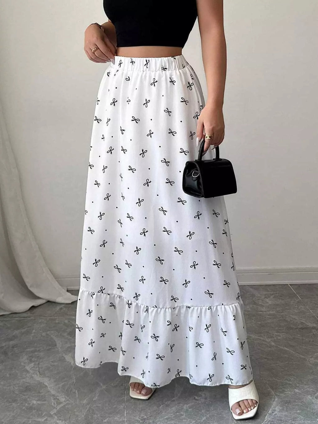 Bowknot print skirt ruffle hem detail