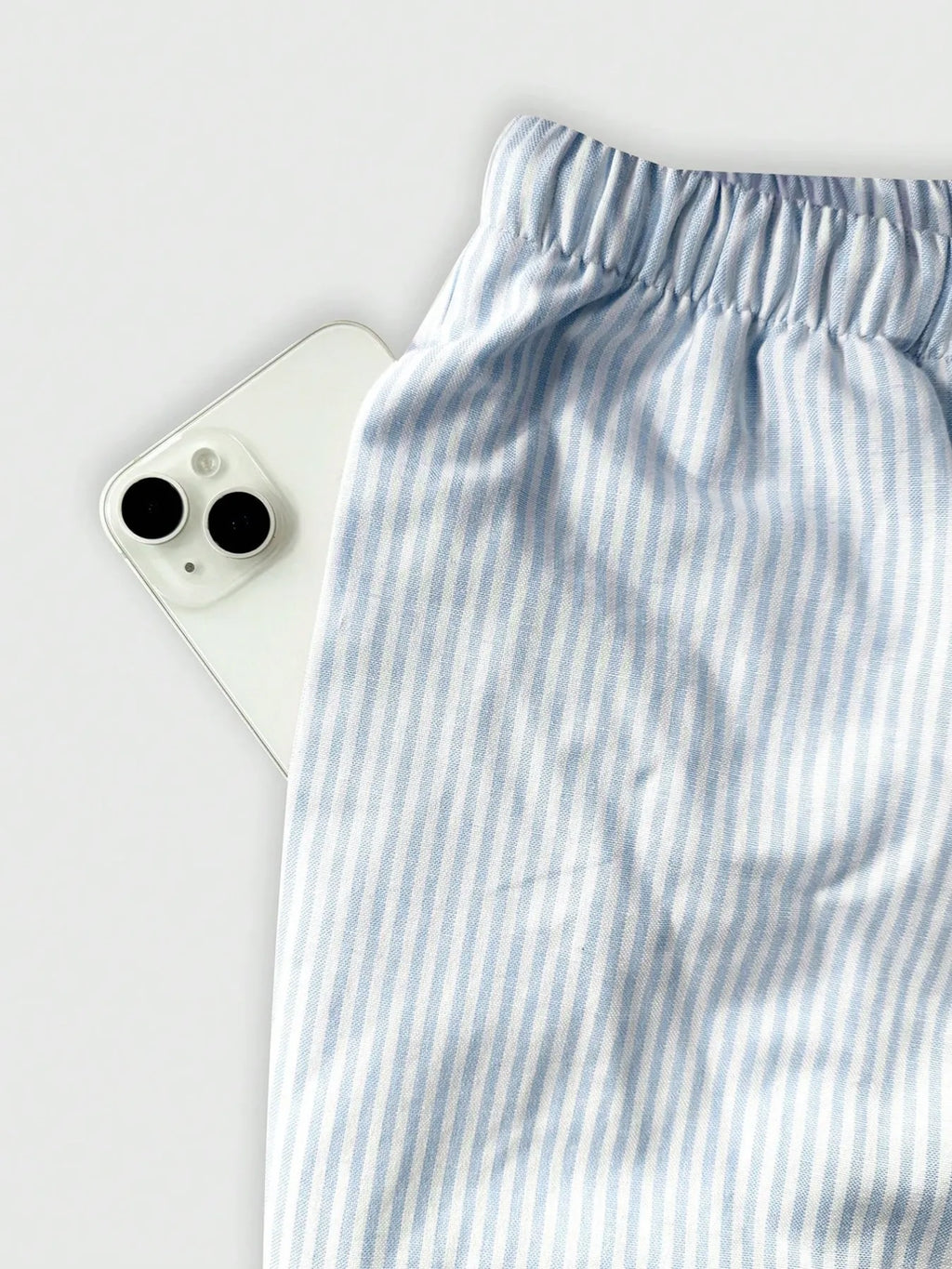 Light pink striped pants side view