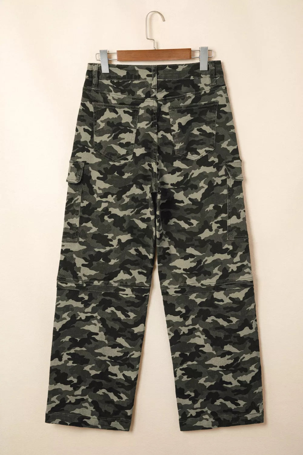 Drawstring waist detail on camo cargo pants