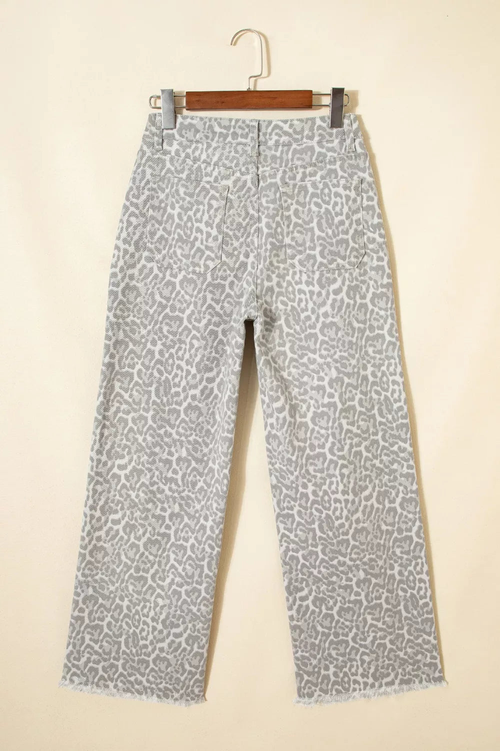 Close up of leopard print pattern on white denim