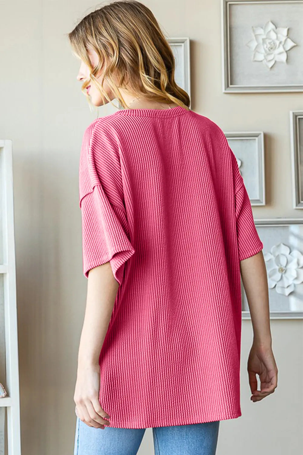 Ribbed half button drop shoulder top side view showing relaxed fit