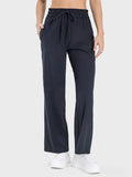 Drawstring pocketed active pants front view