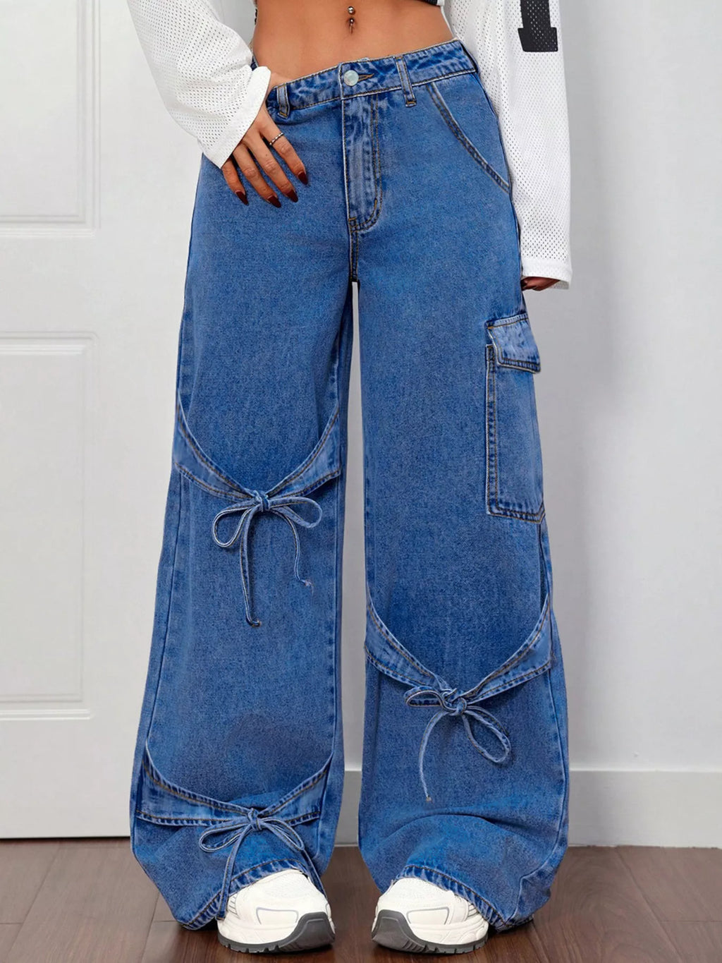 Bow tie accent wide leg jeans in dark blue front view